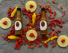 Load image into Gallery viewer, Kaʻu Spice Haven Pineapple Habanero hot sauce
